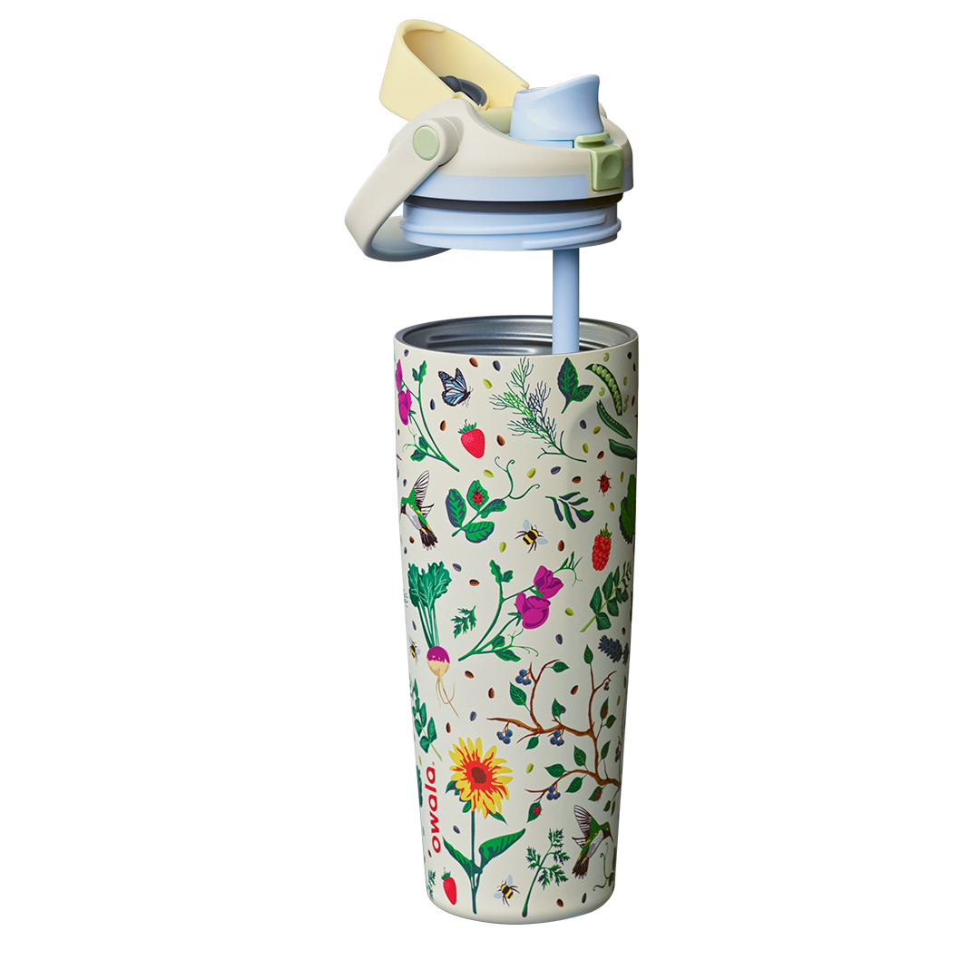 Owala FreeSip Sway 30oz exploded view, cream body with garden pattern shown with lid lifted off revealing the silicone straw and stainless steel interior