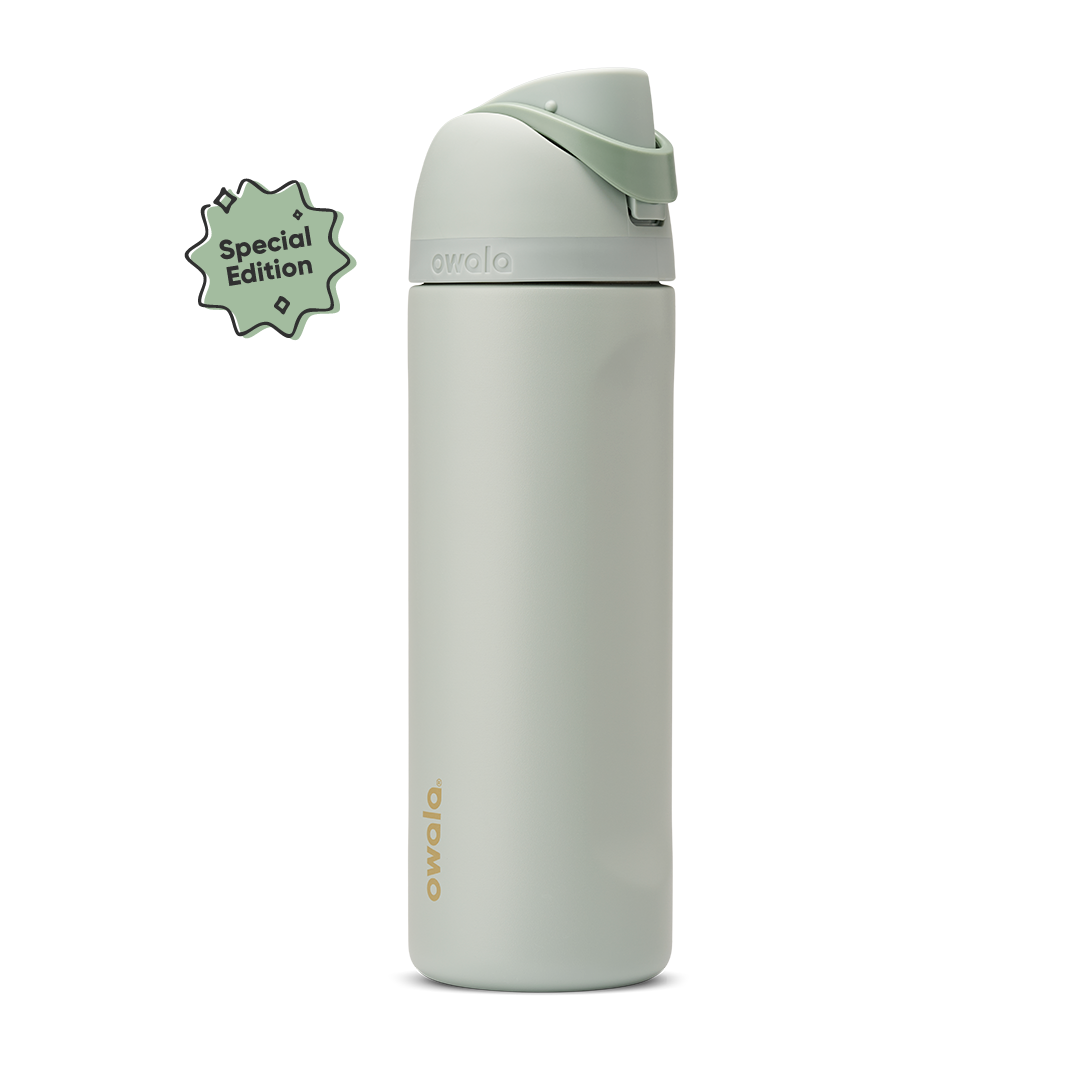 FreeSip Twist 24oz Summer Paradise; soft sage green body with matching pale sage twist cap, sage green twist cap accent band, and cream carry string with pale sage grip