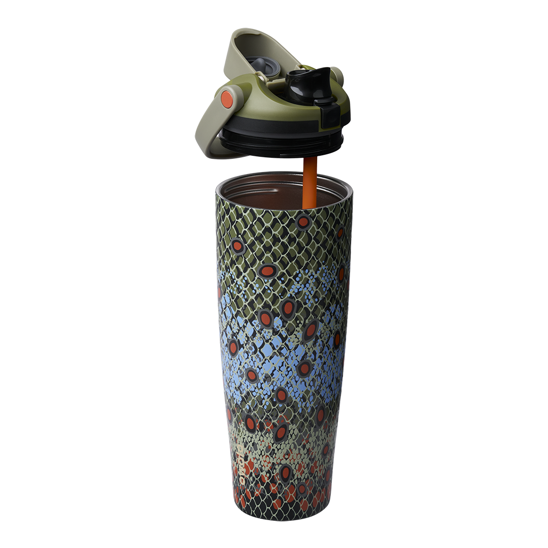 Owala FreeSip Sway 40oz in Off the Hook, fish-scale patterned body in olive green, blue, and orange with olive flip cap lifted above the bottle showing orange straw
