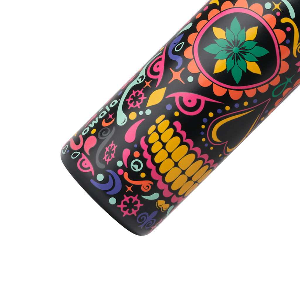 Owala FreeSip Sway 32oz in Sugar Skull, black body with colorful sugar-skull pattern in pink, green, orange, yellow, and purple, white Owala logo; glows in the dark
