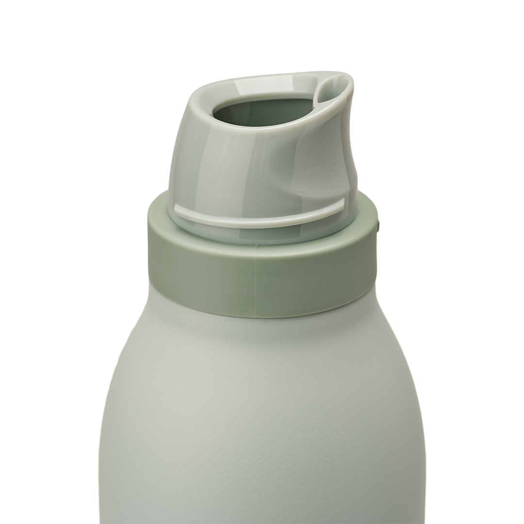 Owala FreeSip Twist 24oz in Summer Paradise, lid detail showing pale sage body with white twist cap, darker sage twist cap accent band, and carry string with carry string grip on top