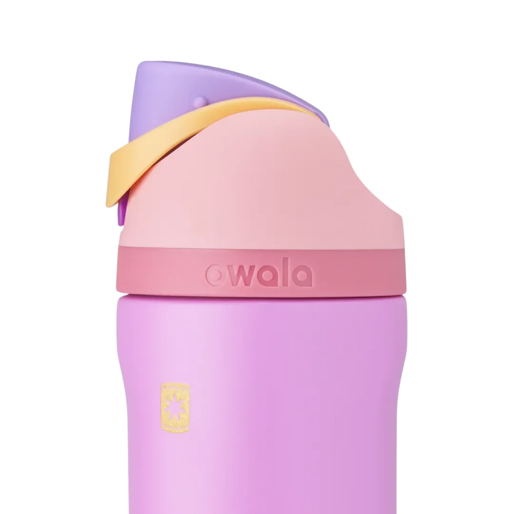 FreeSip Rapunzel Disney Princess Collection lid detail, lilac purple body with peach lid, lavender flip cap, yellow carry loop, and gold sun logo