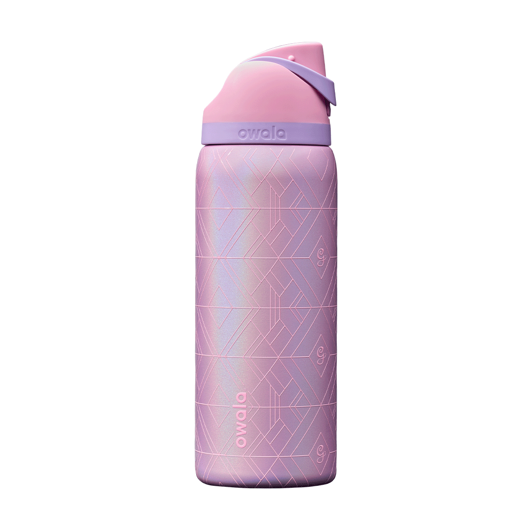 Rotating view of Wicked Glinda edition FreeSip bottle; shimmery iridescent lavender-pink body with geometric diamond-pattern texture, pink flip cap, and lavender carry loop